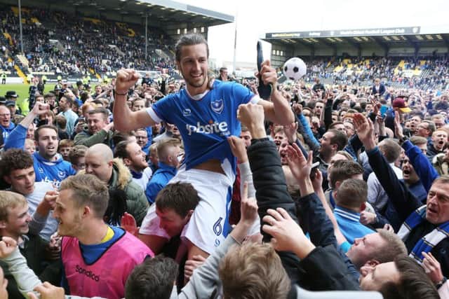 Christian Burgess celebrates with fans