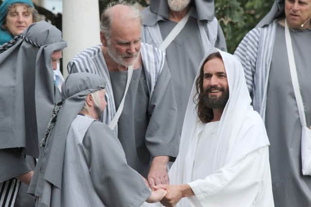 Jesus, played by James Burke-Dunsmore, is ressurected from the dead in the Havant Passion Play