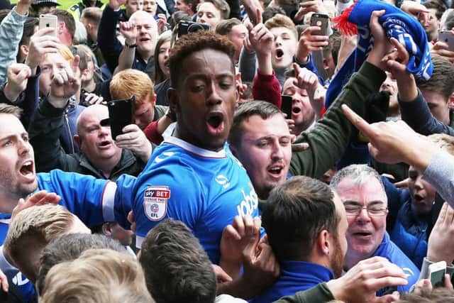 League two - Notts County vs Portsmouth - 17/04/17
Pompey fans run onto the pitch after the final whistle - Portsmouthâ¬"s Jamal Lowe PPP-170418-180152002