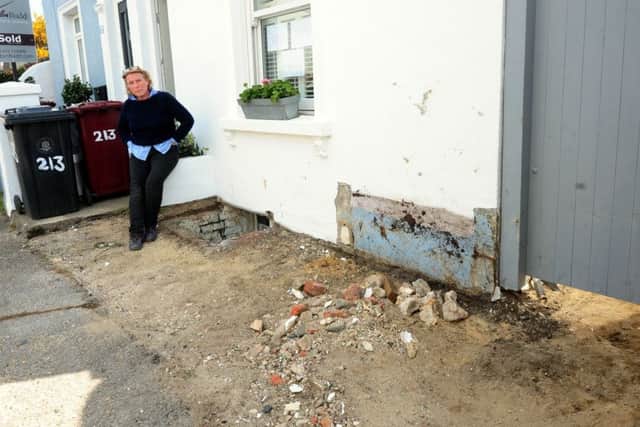Beverly Cowling, 56, outside her home at Oving Road where the car crashed