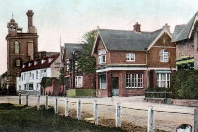 A coloured postcard view of Horndean early in the last century.