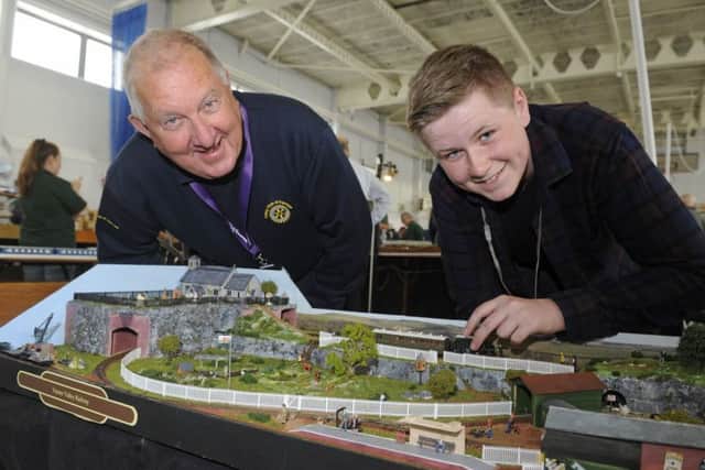 From left, Rotary Club manager Chris Thomas and Gareth Hollis from Stubbington Pictures Ian Hargreaves  (170514-1)