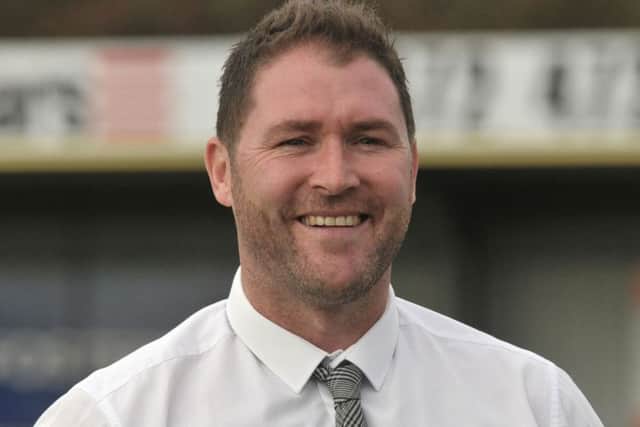 Lee Bradbury has led the Hawks to the Ryman League premier division title and promotion to National League South. Picture: Mick Young