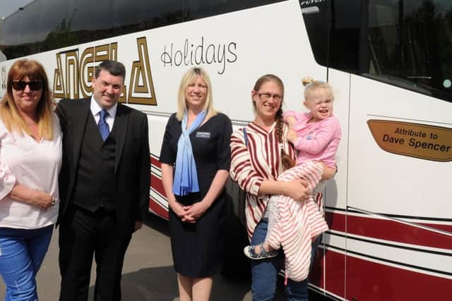 Pictured is: (middle) Robert Pressley, managing director of Angela Coaches and Paula Roe, managing director of Angela Holidays, with David Spencer's daughters (left) Elizabeth Pritchard (46), (right) Vicky Spencer (36) and her daughter Adriana Daborn (3). Picture: Sarah Standing (170508-219)