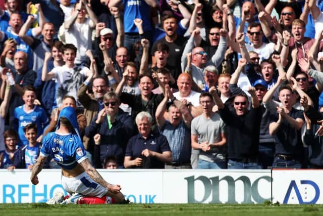 Carl Baker celebrates scoring. Photo by Joe Pepler/Digital South.
