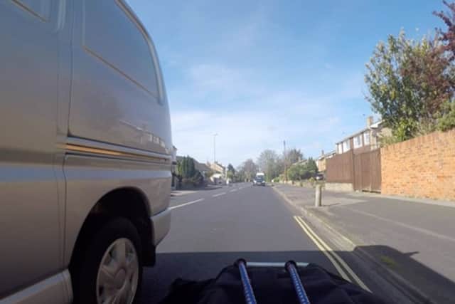 A van coming too close to a cyclist