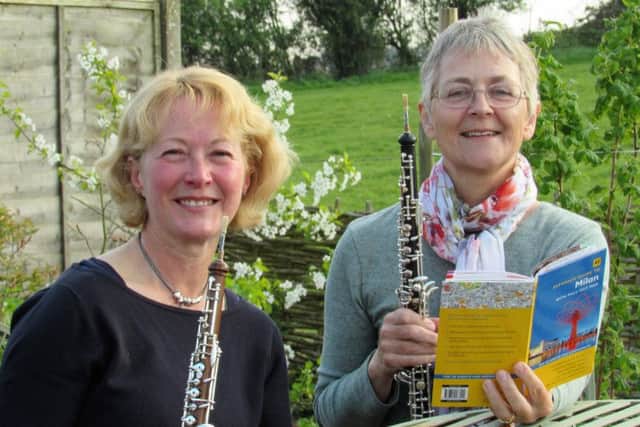 Oboists Mel Espin and Wendy Carpenter will play in Milan