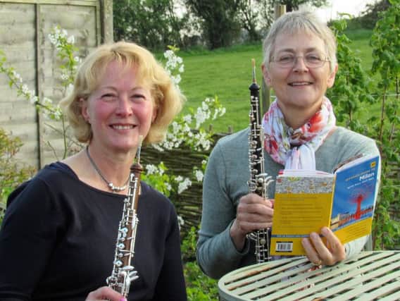 Oboists Mel Espin and Wendy Carpenter will play in Milan