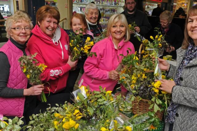 Alice Taylor, Val Hockley and her granddaughter Ellie Hockley and Sandy Mitchell from
Fareham Flower Club at a previous event. They are all taking part in the Lonely Bouquet Campaign