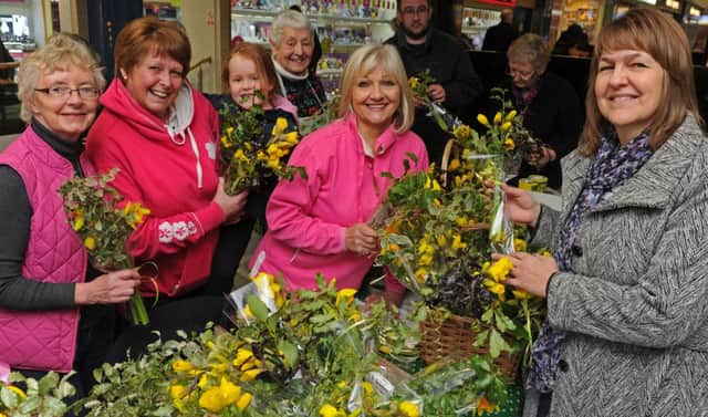 Alice Taylor, Val Hockley and her granddaughter Ellie Hockley and Sandy Mitchell from
Fareham Flower Club at a previous event. They are all taking part in the Lonely Bouquet Campaign
