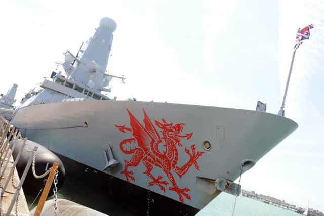HMS Dragon was rededicated in a ceremony at Portsmouth Naval Base on Friday.Picture: Sarah Standing (160941-6380) PPP-160807-154546001