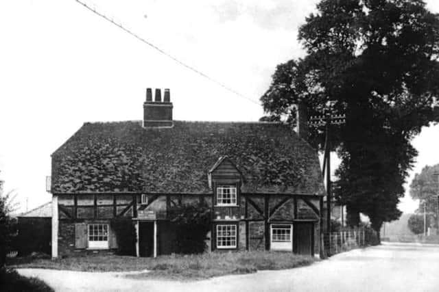 The picturesque cottages that once sat behind the original Coach and Horses pub at Hilsea, Portsmouth.