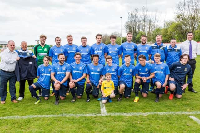 Baffins Milton Rovers FC with Danny Philips from Taylor Wimpey following Taylor Wimpeys donation to their new facilities