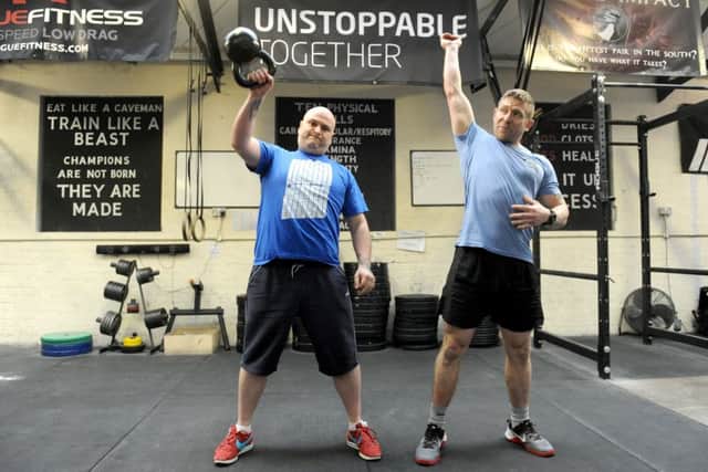 Mike Jackson working out with coach Ray Pharoah at Southern Legion, Hilsea
