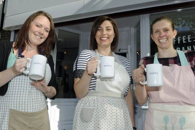 WELCOME From the left are staff members Grace Liddington, Riah Bunce and Kim Ryan  Picture Ian Hargreaves  (170512-1)
