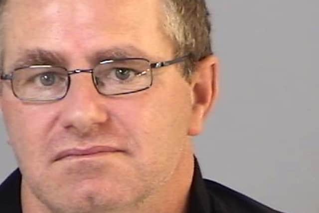 Gary Trower was jailed at Portsmouth Crown Court for two years after sending an 'onslaught of sadistic' sexual messages threatening to rape a woman and a girl