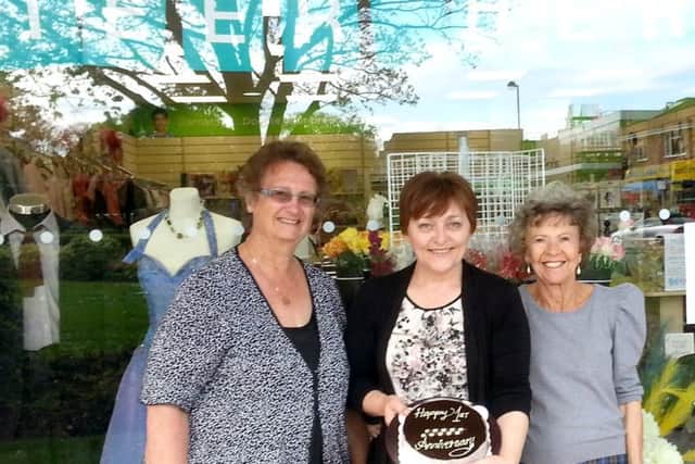 CELEBRATION Branch manager Rayna Magee (centre) with members of her team