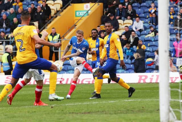 Carl Baker puts Pompey 1-0 up at Mansfield Picture: Joe Pepler