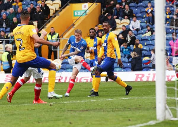 Carl Baker puts Pompey 1-0 up at Mansfield Picture: Joe Pepler