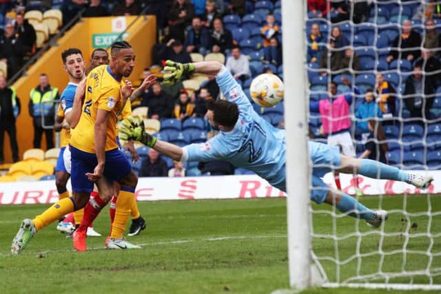 Carl Baker scores Pompey's winner against Mansfield Picture: Joe Pepler