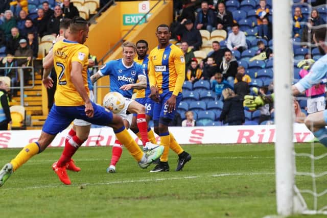 Carl Baker scores Pompey's winner against Mansfield Picture: Joe Pepler