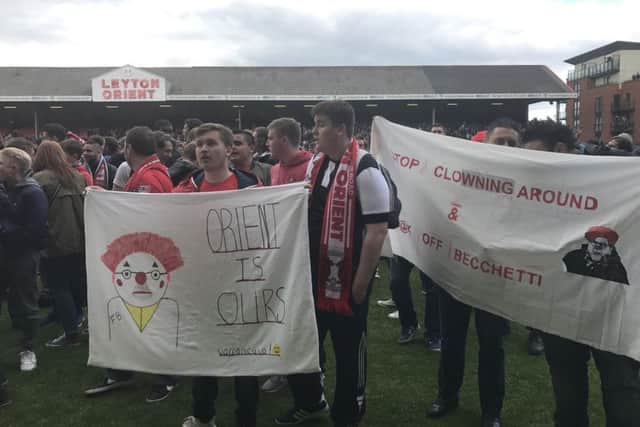 Fans invade the pitch at Brisbane Road during Leyton Orient's game with Colchester