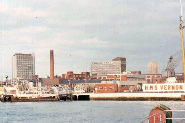 Sign of the times  looking across the Camber from Point, Old Portsmouth, to HMS Vernon, now Gunwharf Quays.