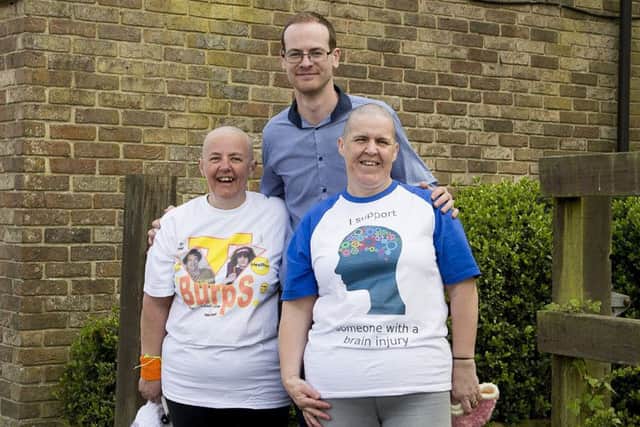 Sharon Wenman, landlord Jake Kettridge and Anna Denby after their charity headshave at the Plough and Barleycorn, in Tempest Avenue, Cowplain