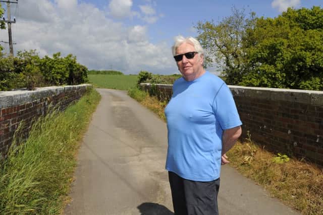 John Suttie, 74, on the track that backs onto his property and leads to the proposed area of development at Downend
Picture: Malcolm Wells (170502-2271)