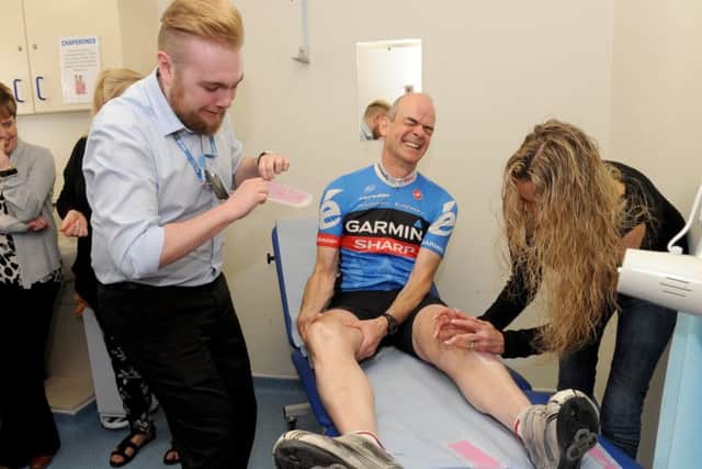 From left, Callum Larkin, Dr Roger Sutton and Dawn Jafkins, practice manager Picture: Sarah Standing (170582-6953)