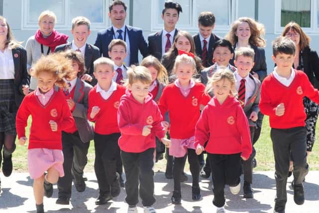 Staff and children from Chichester Free School