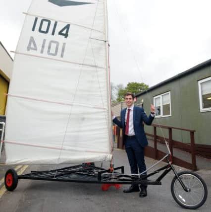 Alex Lowton, 17, with his trapezing land yacht

Picture: Sarah Standing (170578-6829)