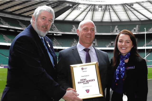 From left, England Rugby Football Schools Union president Geoff Simpson, Dean Dryhurst, and Donna Edmonds from NatWest bank