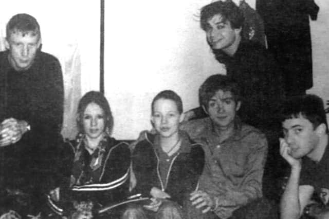 Jodie, third left, with the group and another Blur fan on the night of the Wembley gig