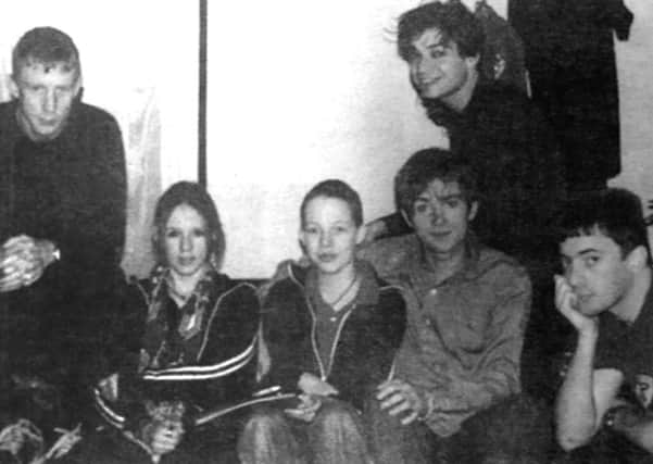 Jodie, third left, with the group and another Blur fan on the night of the Wembley gig