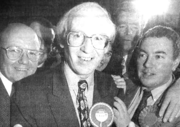 Portsmouth Labour chief Leo Madden, centre, leads the celebrations as his party earns victory