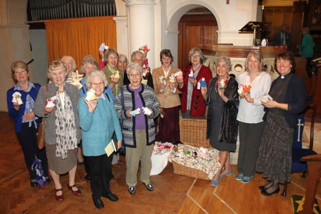 The Easter knitters and,bottom, one of the angels