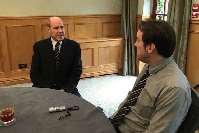 Michael Eisner, left, chatting to The News' chief sports writer, Neil Allen