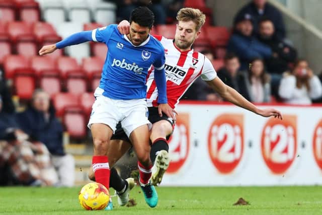 Harry Pell challenges Danny Rose when Pompey travelled to Cheltenham last November