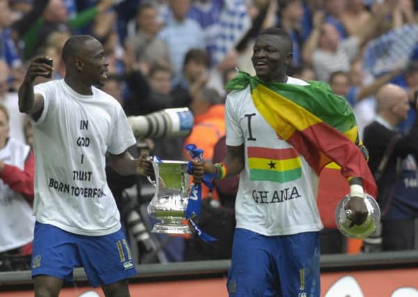 Sulley Muntari and John Utaka with the FA Cup. Picture: Will Caddy