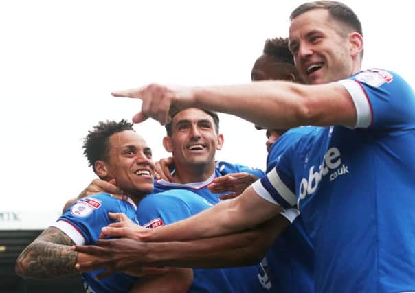 The Pompey players celebrate their title win Picture: Joe Pepler