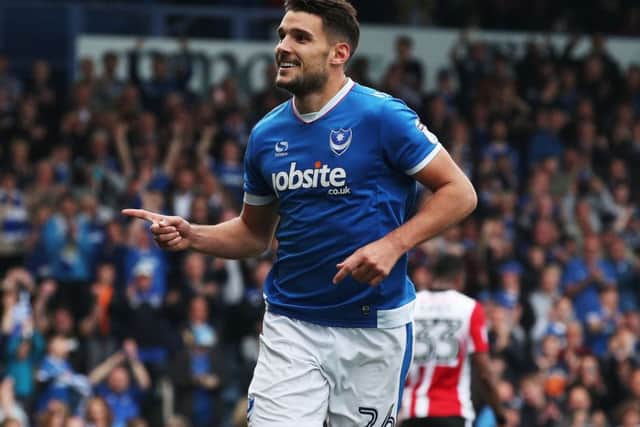 Gareth Evans celebrate scoring in the 6-1 win against Cheltenham