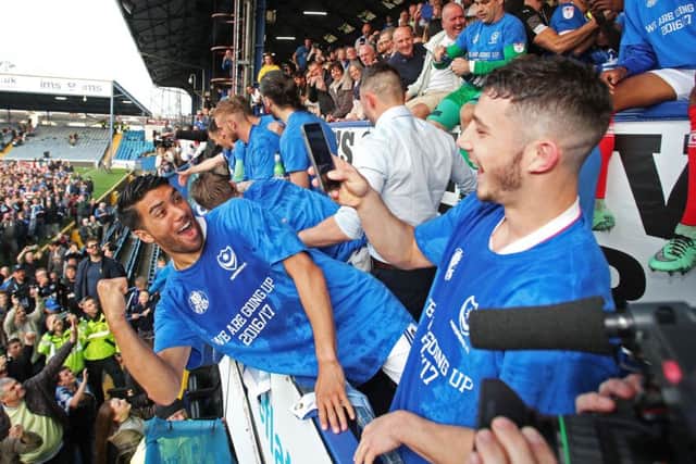 The Pompey players celebrate their title success Picture: Joe Pepler