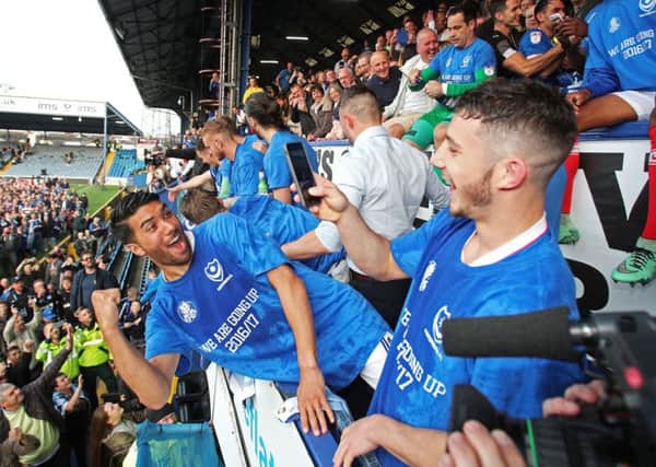 The Pompey players celebrate their title success Picture: Joe Pepler
