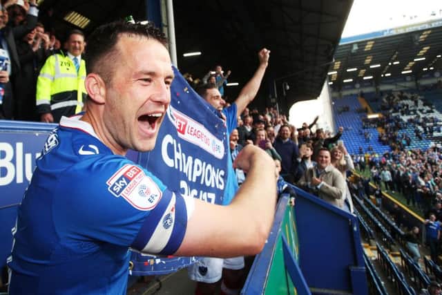 Michael Doyle celebrates the title win. Picture: Joe Pepler