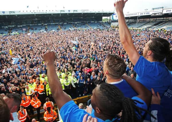 Pompey celebrate dramatically winning the League Two title Pic: Joe Pepler