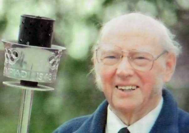 Lt Cdr Clark who used the Olympic flame to light the boiler of HMS Whitesand Bay