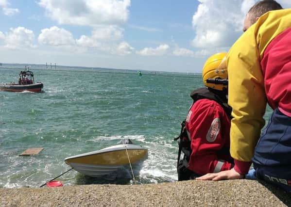 Rescue teams in action. Picture: Portsea Rescue