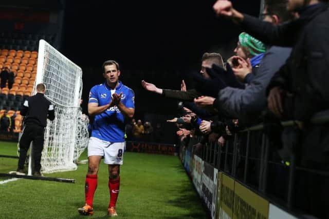 Michael Doyle applauds angry Pompey fans at Barnet in February 2016. Picture: Joe Pepler