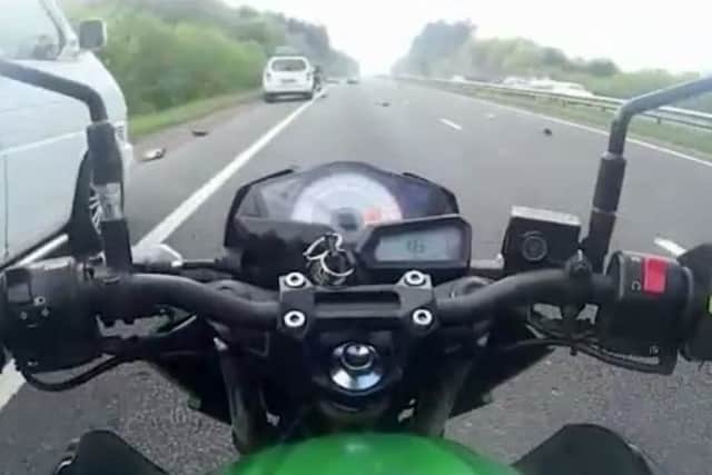 Camera footage from Daniel Lincoln, 21, of Fareham as he pulls up to the crash site. PHOTO: Dorset Police/BNPS